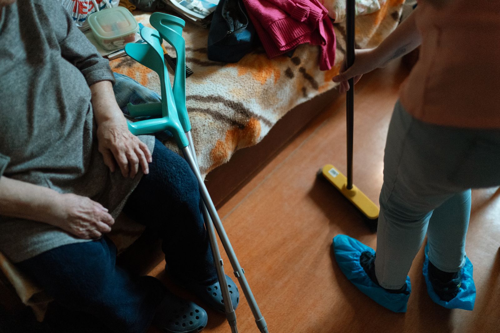 Caregiver helping a senior woman with daily tasks at home in Cairo, GA